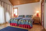 Kids room boasts two twin beds and beautiful views over Lake Carillon